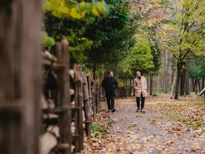 Couple on a crisp fall walk on trail