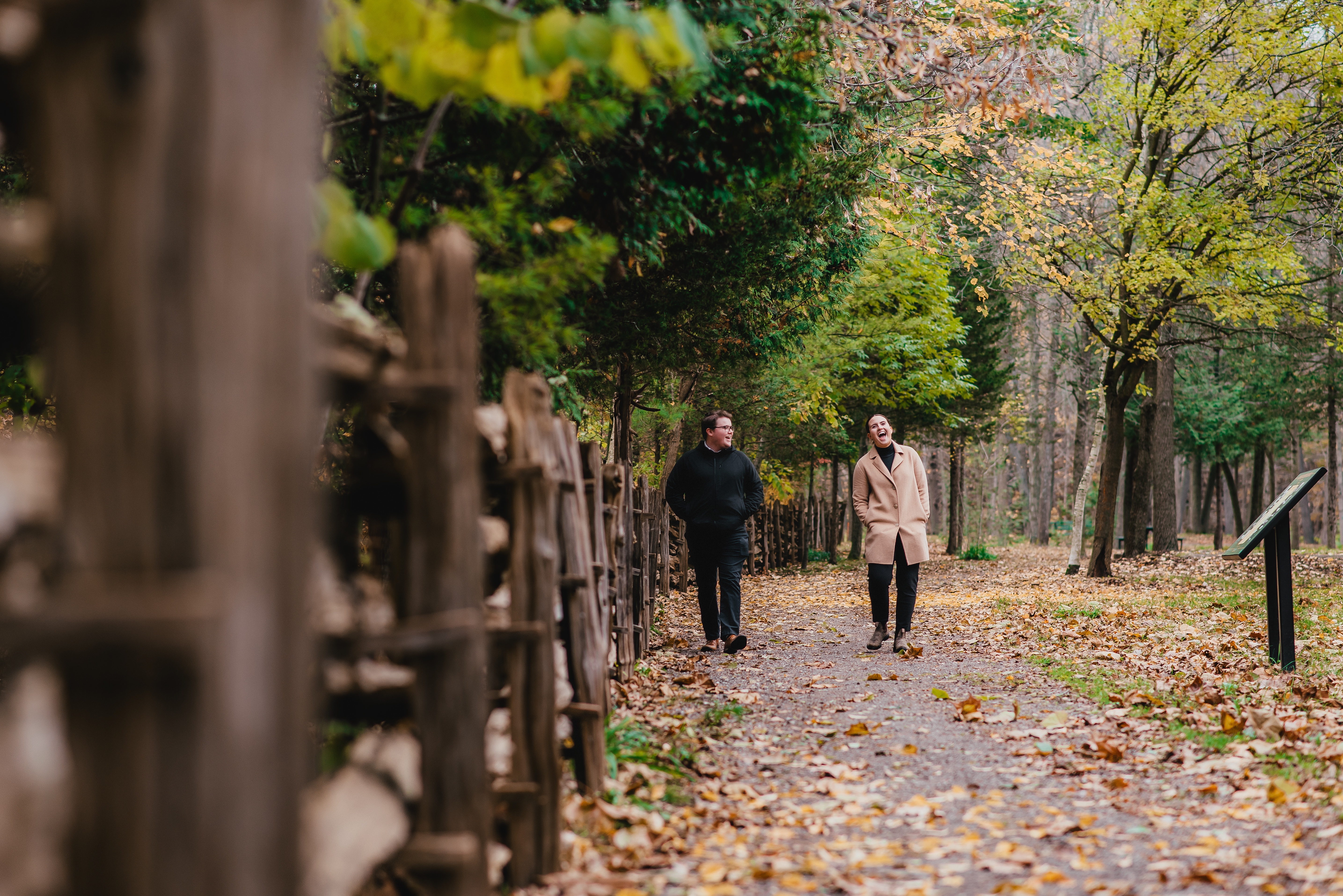 Couple on a crisp fall walk on trail