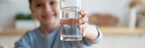 Girl Holding Glass of water